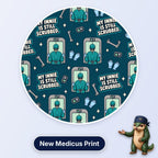 My Innie Is Still Scrubbed scrub cap print: a scrubbed surgeon walking through theatre doors with gloves and scrub bars on dark teal