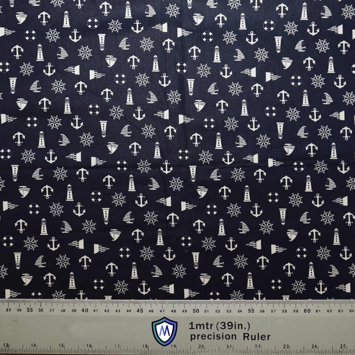 Nautical Ships Lighthouses On Navy Scrub Caps by Medicus Scrub Caps feature a nautical pattern with white anchors, ship wheels, lighthouses, and buoys on navy blue fabric. Ideal for eco-friendly crafting. A 1-meter (39-inch) precision ruler is shown at the bottom for scale.