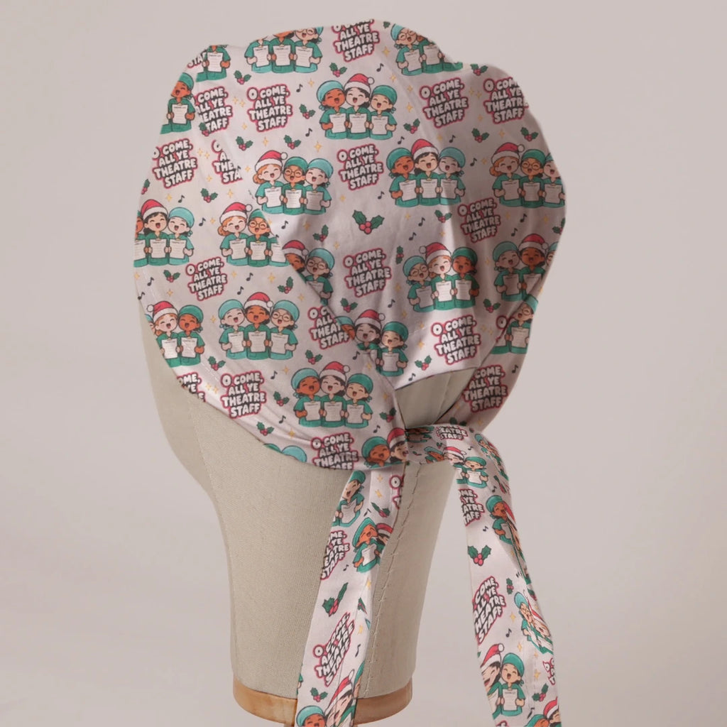 O Come All Ye Theatre Staff scrub cap in Bandana tie-back style on mannequin head, back view with ties