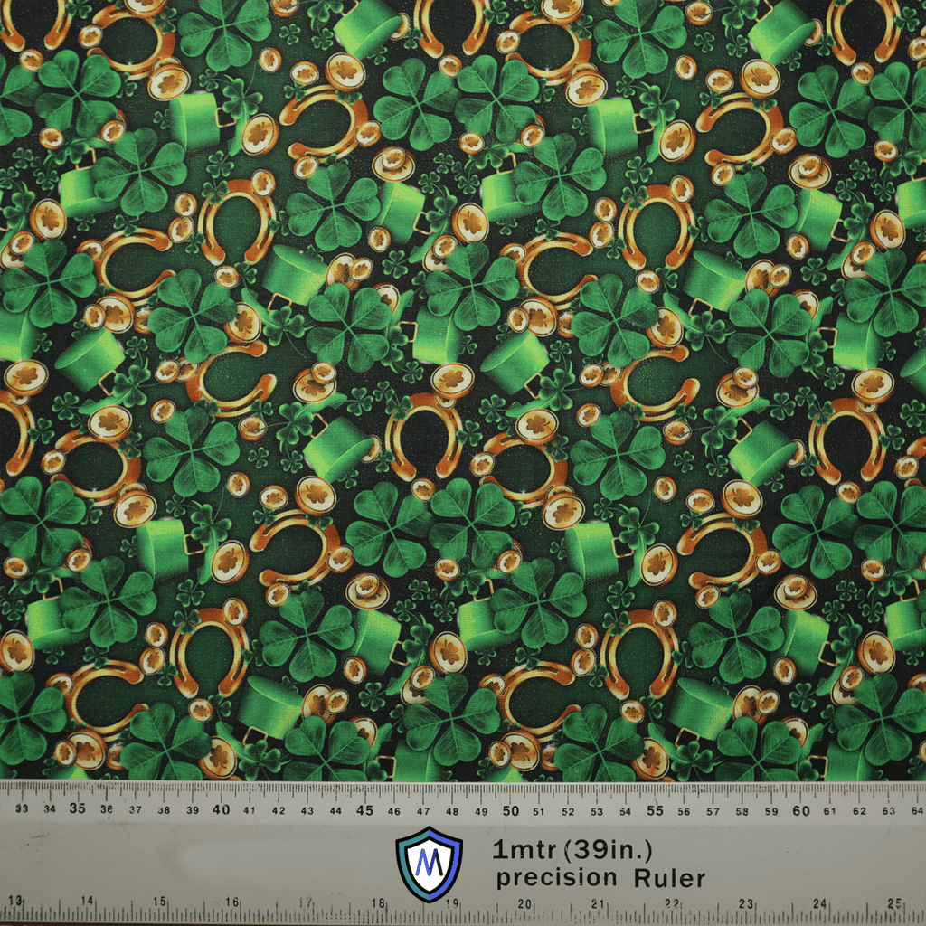 The Paddy Luck Of The Irish Scrub Cap by Medicus Scrub Caps features a lively pattern with green shamrocks, top hats, and golden coins on a dark background. It includes a 1mtr (39in) scale ruler at the bottom and a logo for comfort and sustainable fit.