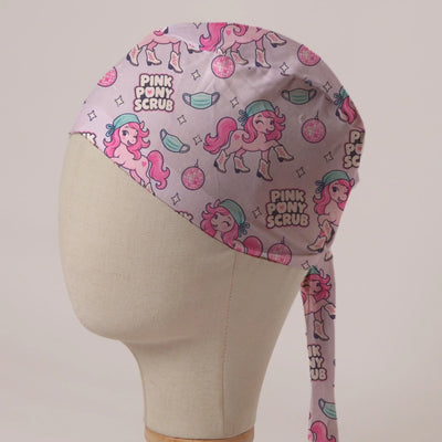 Pink Pony Scrub scrub cap in Bandana tie-back style: pink ponies in scrub caps and cowboy boots with disco balls on pale pink
