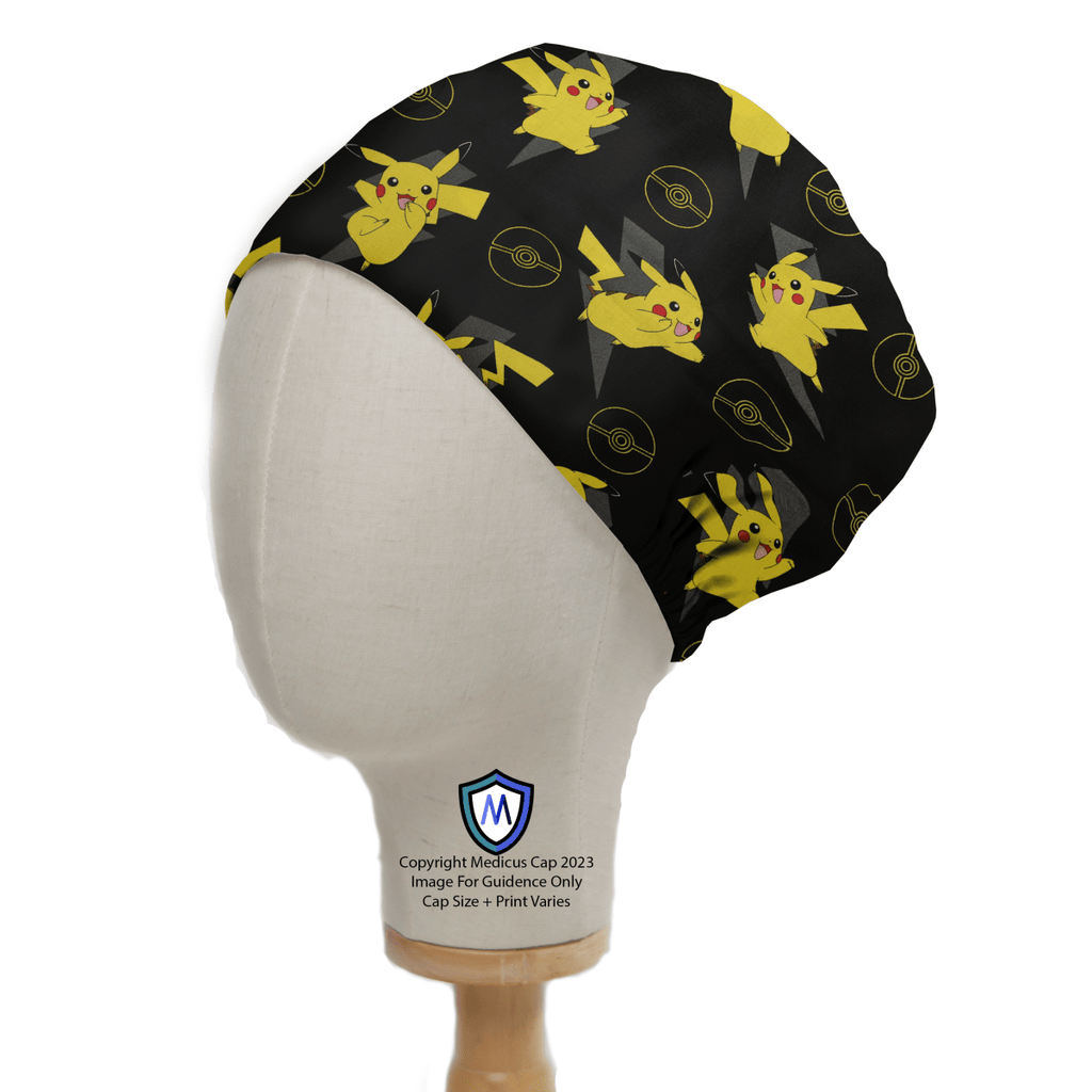 A mannequin head displays a Medicus Scrub Caps Pokemon Pikachu Yellow On Black Scrub Cap, featuring yellow cartoon characters and lightning bolts. The stand notes Copyright Medicus Cap 2023 and Image for Guideline Only Cap Size + Print Varies, emphasizing its healthcare style.