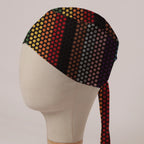Rainbow Dots scrub cap in Bandana tie-back style: rainbow stripes of polka dots on black