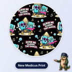 Scrub Me Closer Tiny Dancer scrub cap print: scrub brushes in star sunglasses and feather boas dancing under spotlights on black