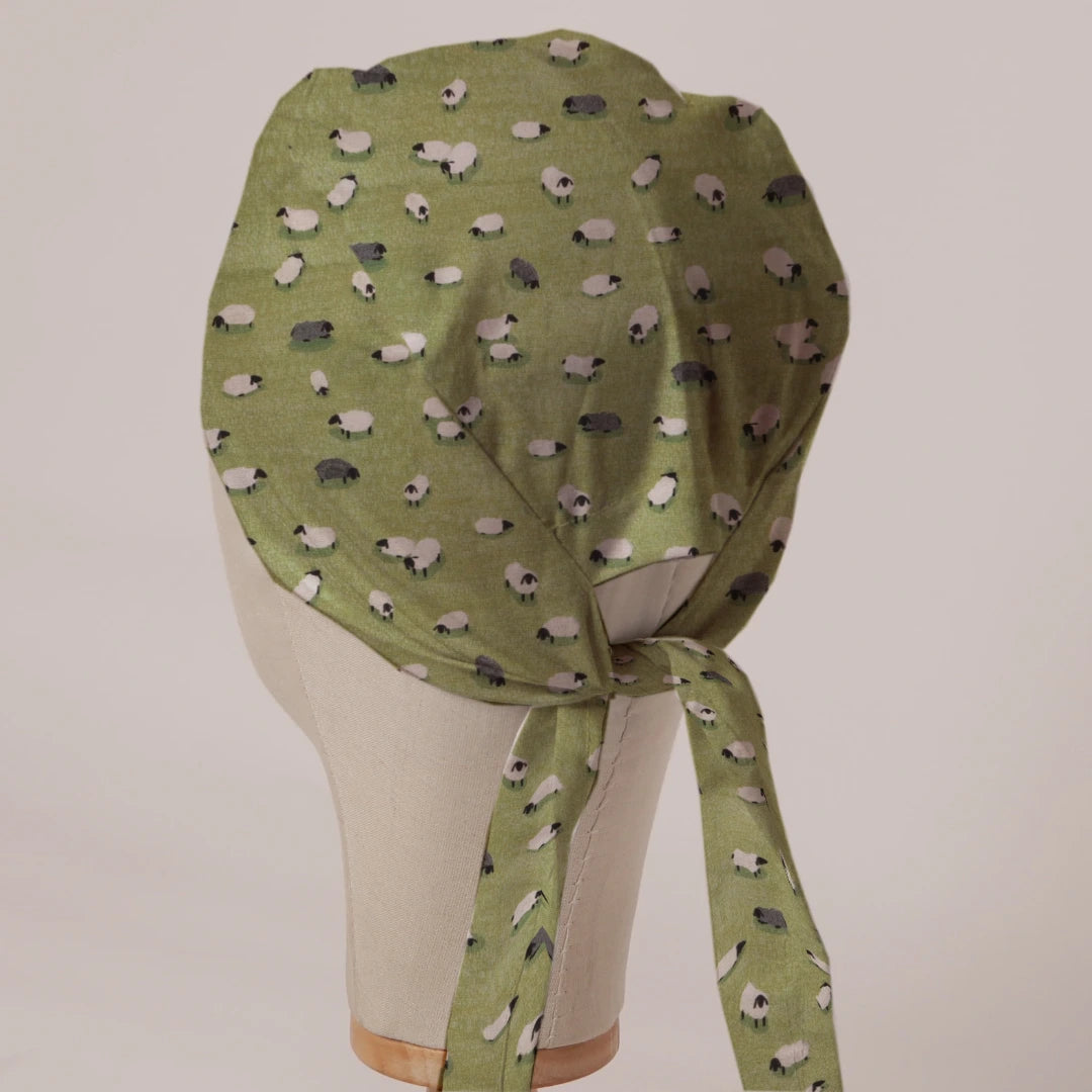 Sheep Fields scrub cap in Bandana tie-back style on mannequin head, back view with ties