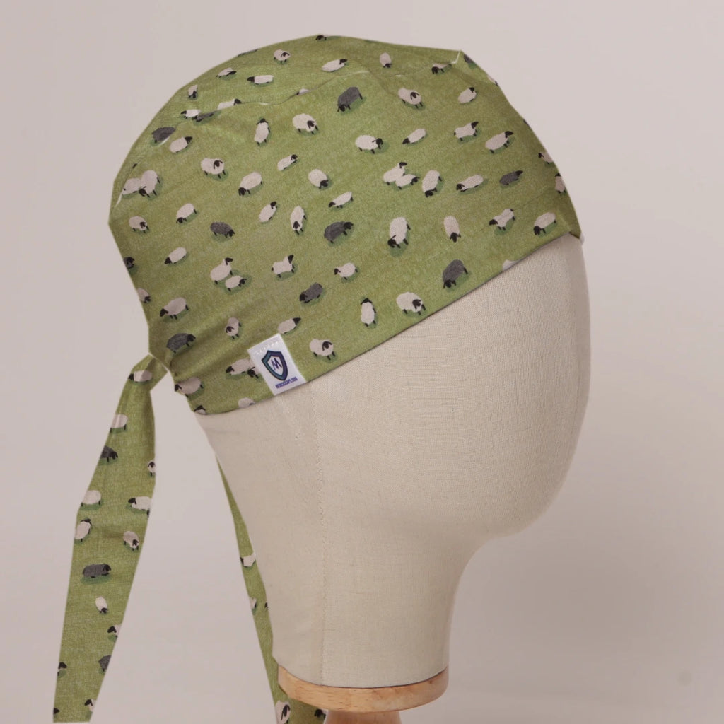 Sheep Fields scrub cap in Bandana tie-back style on mannequin head, front right view with the Medicus label