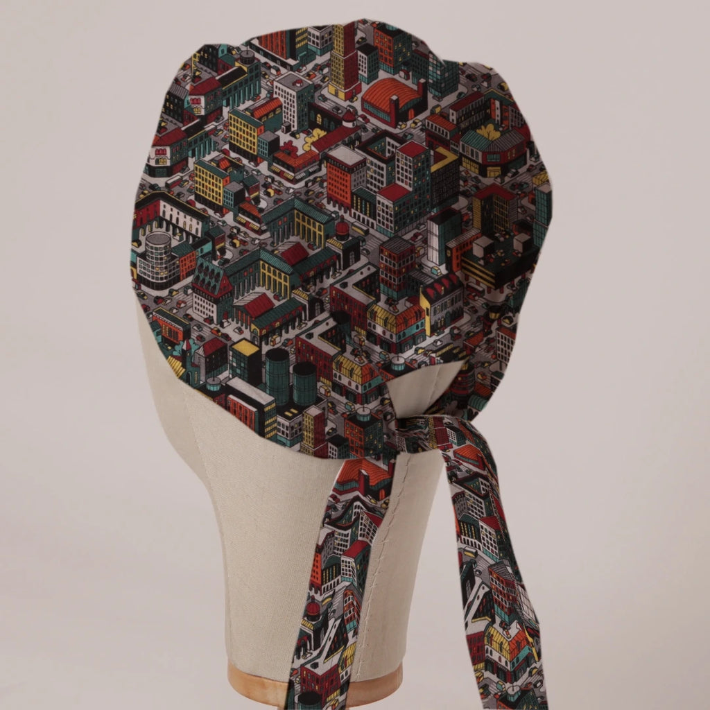 Sim City Inspired Isometric City scrub cap in Bandana tie-back style on mannequin head, back view with ties