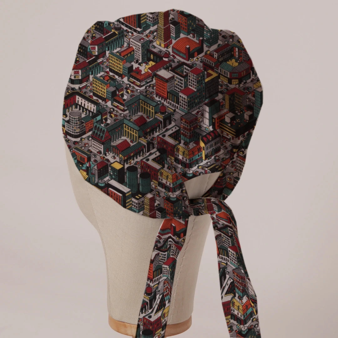 Sim City Inspired Isometric City scrub cap in Bandana tie-back style on mannequin head, back view with ties