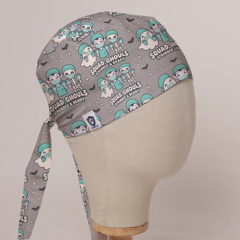 Squad Ghouls Scrubbed & Ready scrub cap in Bandana tie-back style on mannequin head, front right view with the Medicus label