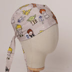 Star Wars Kawaii on Beige fabric scrub cap in Bandana tie-back style on mannequin head, front right view with the Medicus