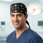 Black Star Wars character print scrub cap with tie-back closure worn by smiling healthcare professional