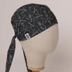 Surgeon Barbershop scrub cap in Bandana tie-back style on mannequin head, front right view with the Medicus label