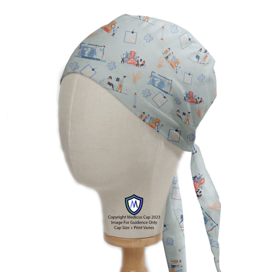 A mannequin head wears a pale blue Medicus Scrub Cap with surgery, hand, bone, and ankle-themed medical illustrations, tied at the back for a secure fit.