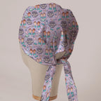 The Great British Scrub Off scrub cap in Bandana tie-back style on mannequin head, back view with ties