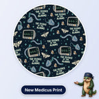 The Silence Of The Alarms scrub cap print: patient monitors, muted bells, moths and breathing circuits on dark navy