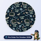 The Silence Of The Alarms scrub cap print: patient monitors, muted bells, moths and breathing circuits on dark navy, with a Pre Order For October 2026 badge