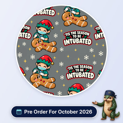 Tis The Season To Be Intubated scrub cap print: an elf anaesthetist intubating a gingerbread man with snowflakes on grey, with a Pre Order For October 2026 badge