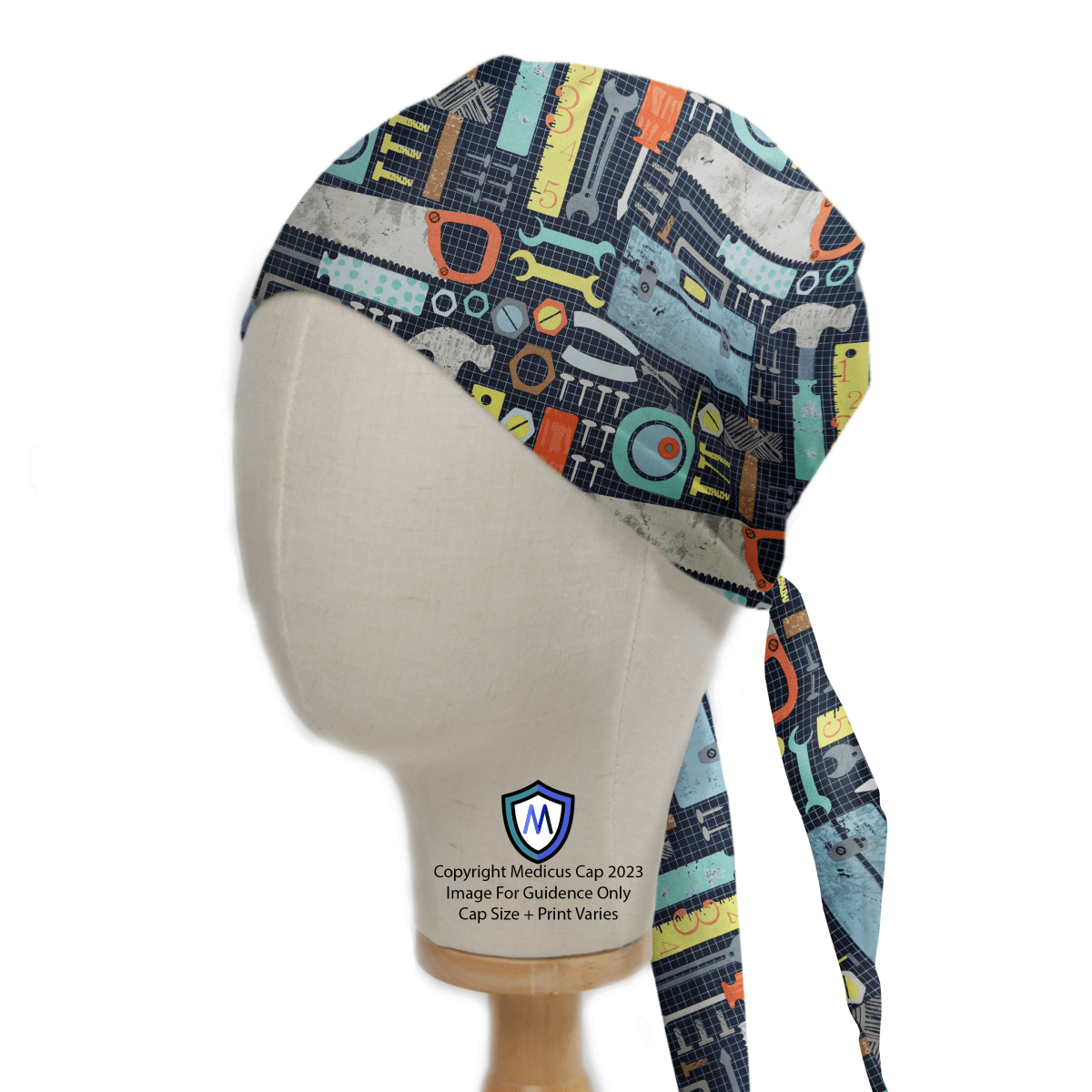 A mannequin head displays the Medicus Scrub Caps Tools Box Saw Hammer Large Scrub Cap, adorned with a colorful array of tools and gadgets like wrenches and cogs on a dark backdrop. The ties hang stylishly, making it a sustainable choice for professionals.