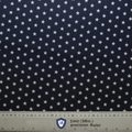 The USA Stars On Navy Scrub Cap by Medicus Scrub Caps is a dark blue fabric adorned with small white stars, ideal for reusable scrub caps. A 1-meter (39-inch) ruler at the bottom highlights its sustainable healthcare fashion focus.