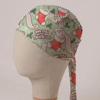 Who Stole The Theatre List scrub cap: Christmas stockings stuffed with long theatre lists and holly on sage green