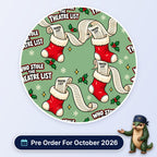Who Stole The Theatre List scrub cap print: Christmas stockings stuffed with long theatre lists and holly on sage green, with a Pre Order For October 2026 badge