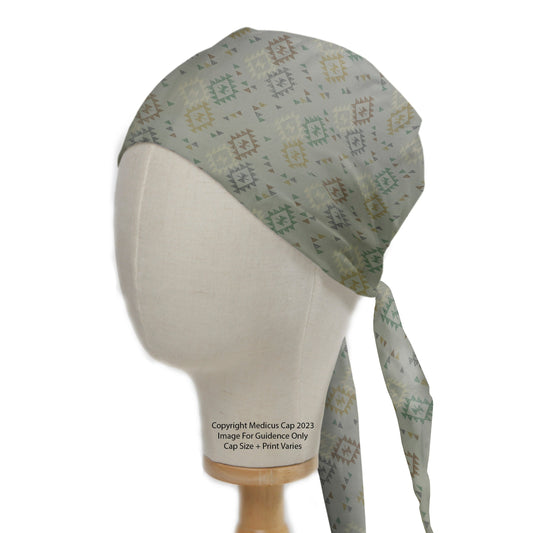 Boheme Boho Geometric Shapes Theatre Scrub Cap from Medicus Scrub Caps, featuring a stylish geometric pattern on a soft fabric, displayed on a mannequin head.