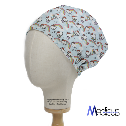 A mannequin displays the Medicus Scrub Caps Hello Kitty scrub cap, featuring Hello Kitty, rainbows, clouds, and stars on a light-blue background. Logo at the bottom right.