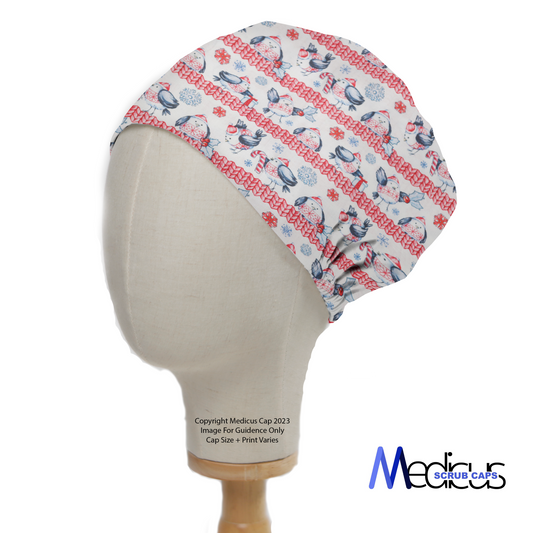 On a mannequin head, the eco-friendly Christmas Fat Birds Snow Jumper Scrub Cap by Medicus Scrub Caps features festive birds, hearts, and snowflakes on a white background.