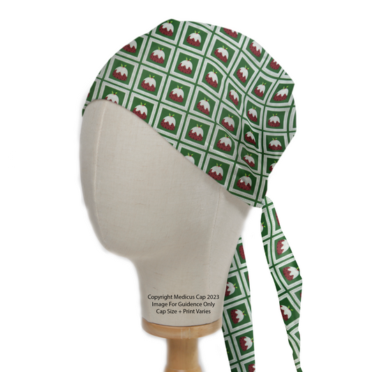 Christmas Puddings Green Grid Scrub Cap from Medicus Scrub Caps, featuring a festive pudding pattern on a green grid background.