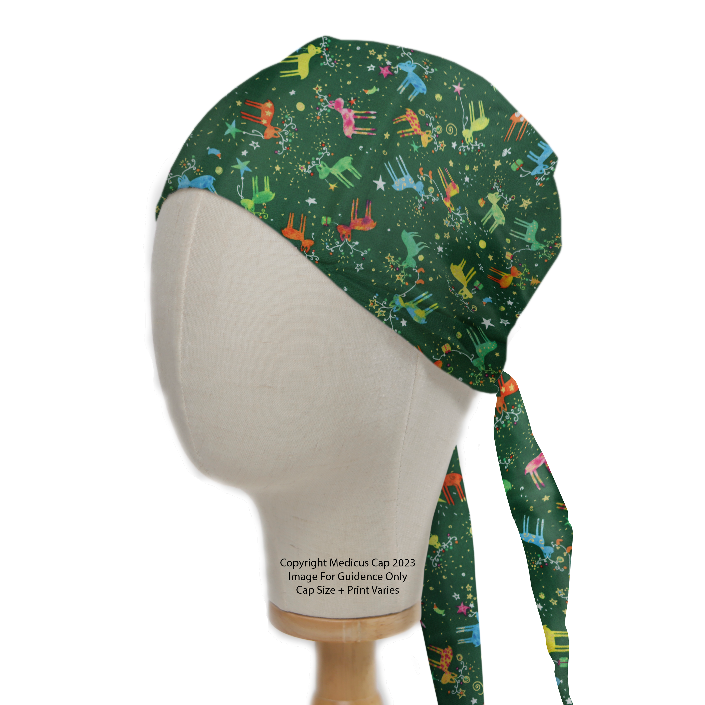 A mannequin head displays the Christmas Reindeer Lights scrub cap by Medicus Scrub Caps, featuring colorful reindeer, festive stars, and a tie-back design.