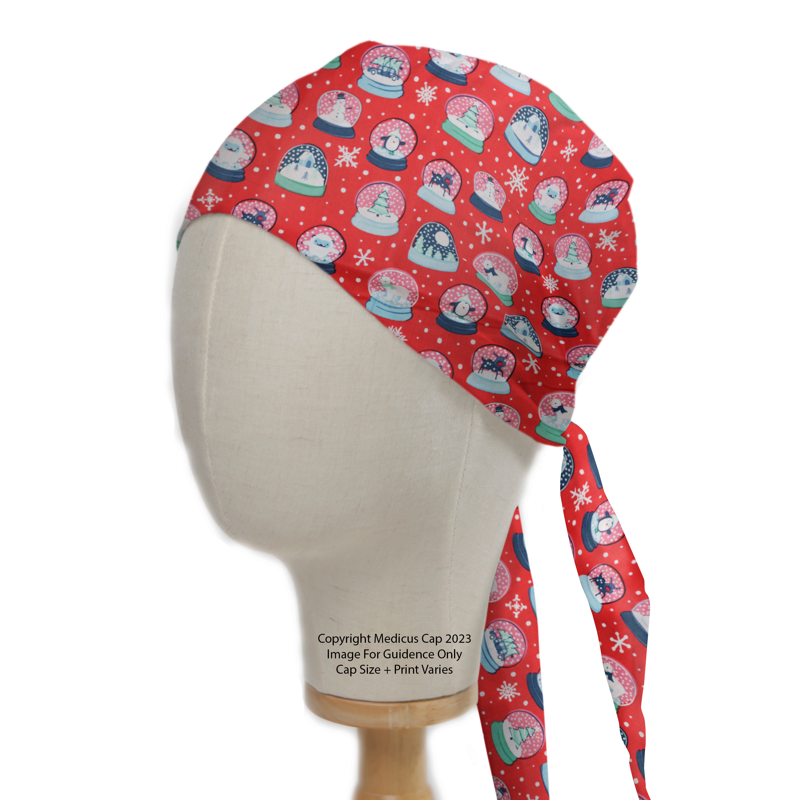 Festive Medicus Scrub Caps Christmas Snow Globes Red Scrub Cap on a mannequin, featuring snowmen and snowflakes in snow globes. Tie-back design for comfort.