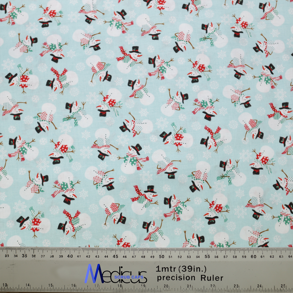 The Christmas Snowmen Scrub Cap by Medicus Scrub Caps features a festive pattern of snowmen in hats and scarves on a light blue background.