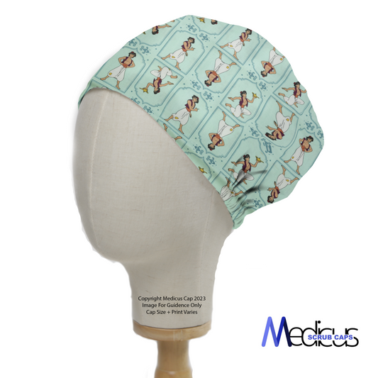 A mannequin head models a Disney Aladdin Pose Theatre Cap by Medicus Scrub Caps, featuring Aladdin in various poses on a light blue background.