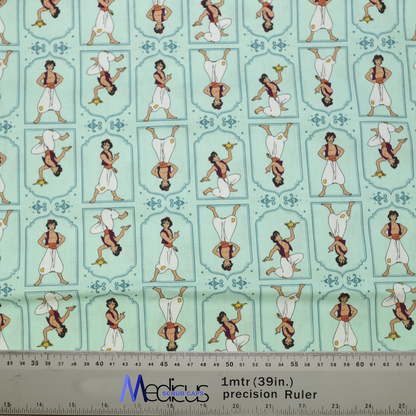 The Disney Aladdin Pose Theatre Cap by Medicus Scrub Caps features light blue fabric with playful Aladdin poses, perfect for whimsical, comfortable scrub caps. Ruler included for scale.