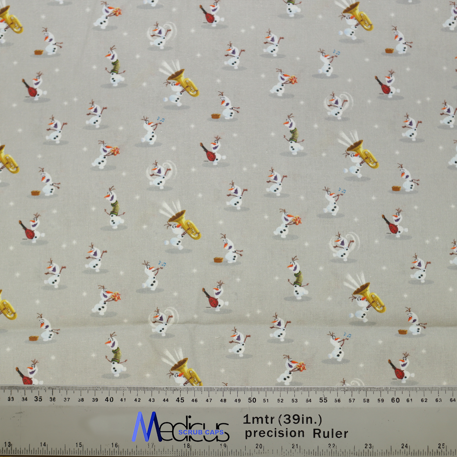 Disney Frozen Olaf Skating Music Grey Scrub Cap from Medicus Scrub Caps, featuring playful Olaf designs on a light grey background with musical and skating elements.