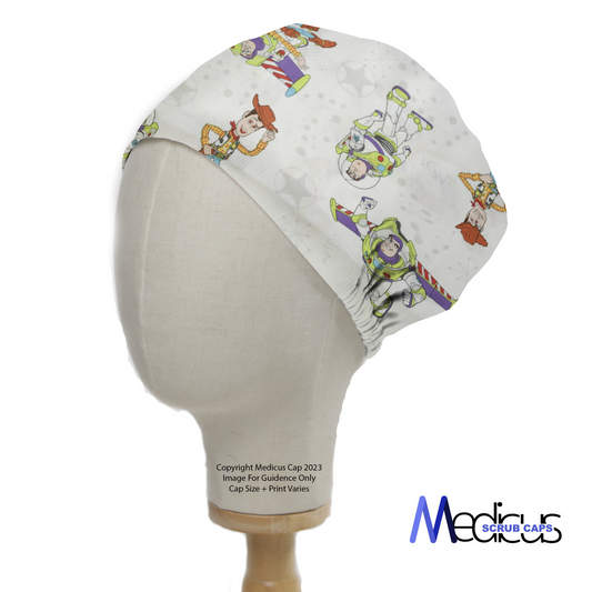 A mannequin head displays the Disney Pixar Toy Story Buzz Woody Flying White Scrub Cap by Medicus Scrub Caps, featuring Buzz and Woody on a white background.