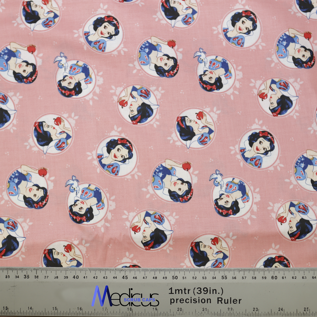 Disney Princess Snow White on Pink Scrub Cap fabric from Medicus Scrub Caps, featuring Snow White in various poses on a soft pink background.