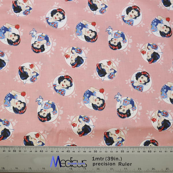 Disney Princess Snow White on Pink Scrub Cap fabric from Medicus Scrub Caps, featuring Snow White in various poses on a soft pink background.