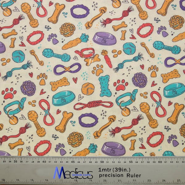 Dogs Accessories Collars Scrub Cap from Medicus Scrub Caps, featuring a playful pattern of dog toys, bones, bowls, and paw prints on a light background.