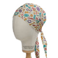 Dogs Accessories Collars Scrub Cap from Medicus Scrub Caps, featuring a playful dog-themed pattern with collars, bones, and toys on a neutral background.