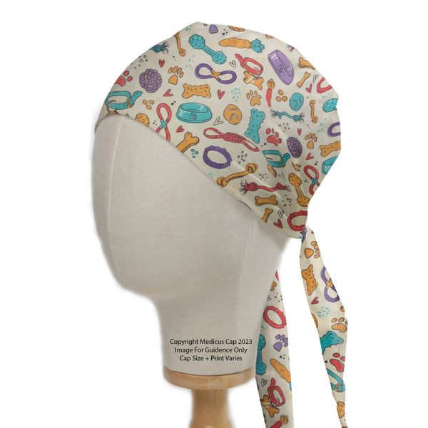 Dogs Accessories Collars Scrub Cap from Medicus Scrub Caps, featuring a playful dog-themed pattern with collars, bones, and toys on a neutral background.