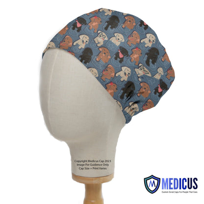 A mannequin head displays a Medicus Scrub Cap featuring playful dogs peeking from jean pockets on a blue background, reflecting their custom, fun designs.