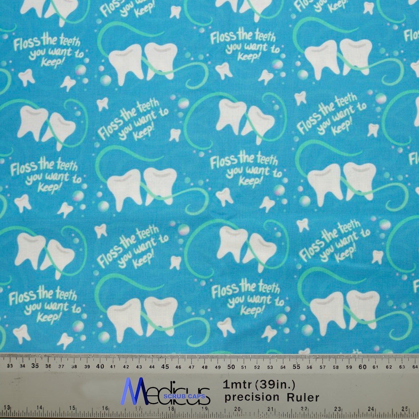 The Floss The Teeth You Want To Keep Dentist Scrub Cap by Medicus Scrub Caps features blue fabric with teeth, floss patterns, and playful dental-themed text.