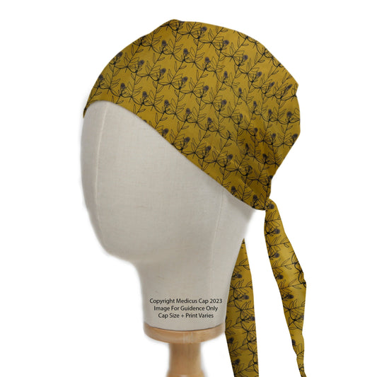 Flowers On Mustard Scrub Cap from Medicus Scrub Caps, featuring a delicate floral pattern on a mustard background with tie-back design.