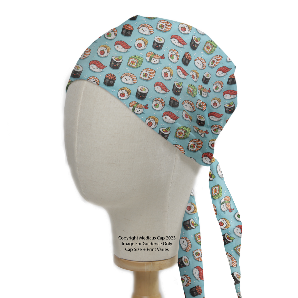 A mannequin head displays a Food Kawaii Sushi Scrub Cap by Medicus Scrub Caps, featuring a playful sushi pattern on light blue with adjustable ties.