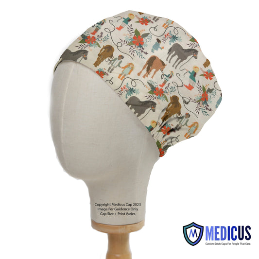 A mannequin head displays the Horse + Handler Scrub Cap by Medicus Scrub Caps, featuring a charming pattern of horses, handlers, and floral accents.