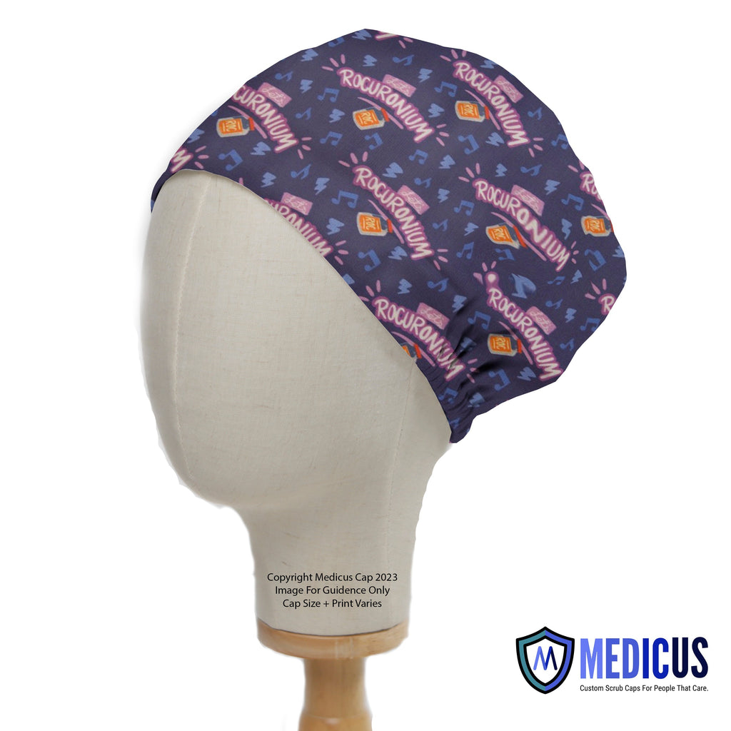 Side view of a mannequin head wearing a "Let's Rocuronium" Medicus Scrub Cap with vibrant lettering, vials, and music notes. Eco-friendly design for healthcare professionals.