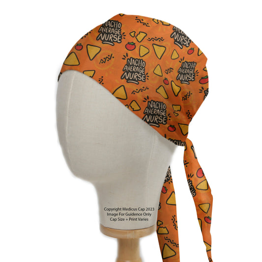 A mannequin head displays the eco-friendly Nacho Average Nurse Scrub Cap by Medicus Scrub Caps, featuring playful nacho and cheese designs on an orange background.