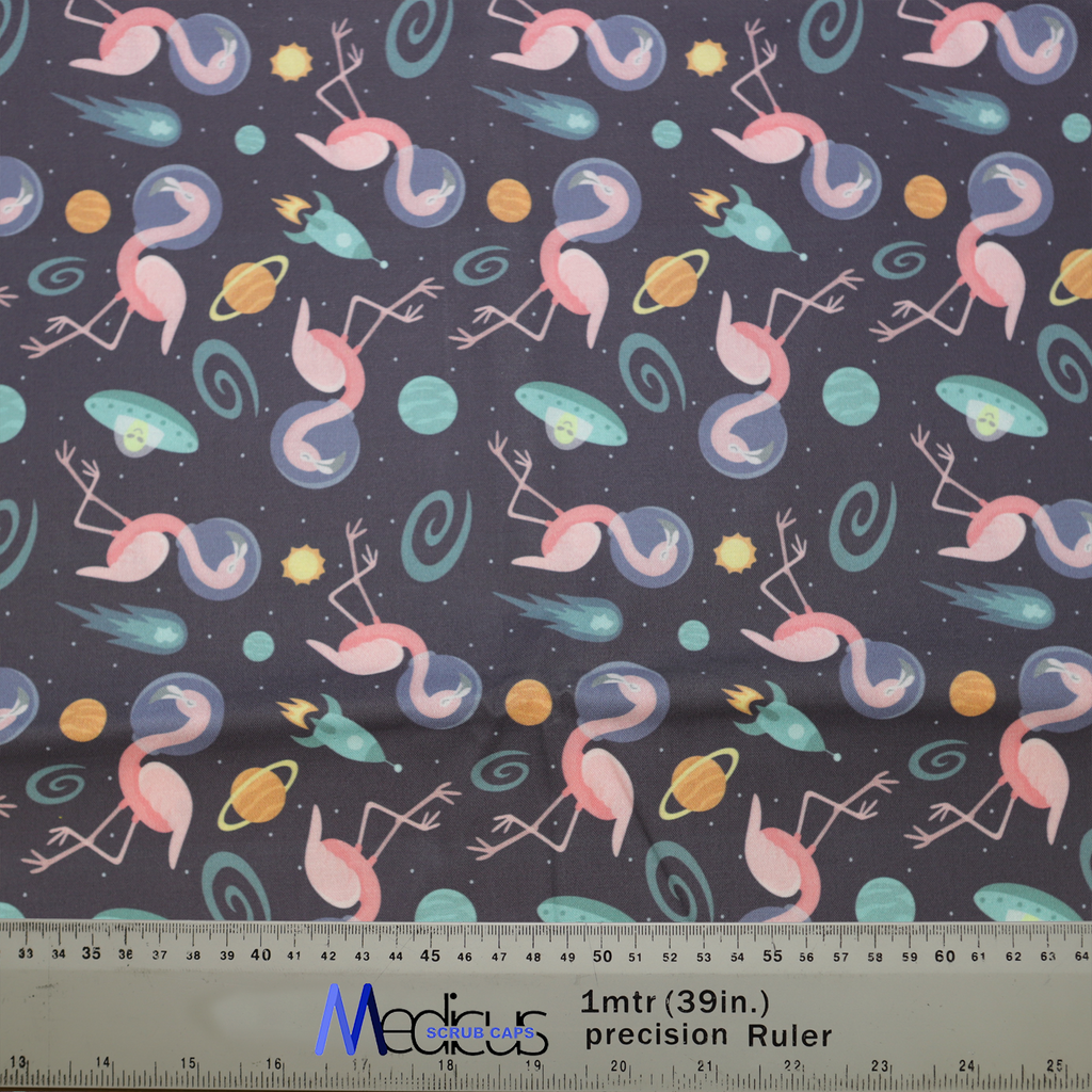Space Flamingoes Travel Scrub Cap from Medicus Scrub Caps, featuring pink flamingoes in space with planets, rockets, and UFOs on a dark background.