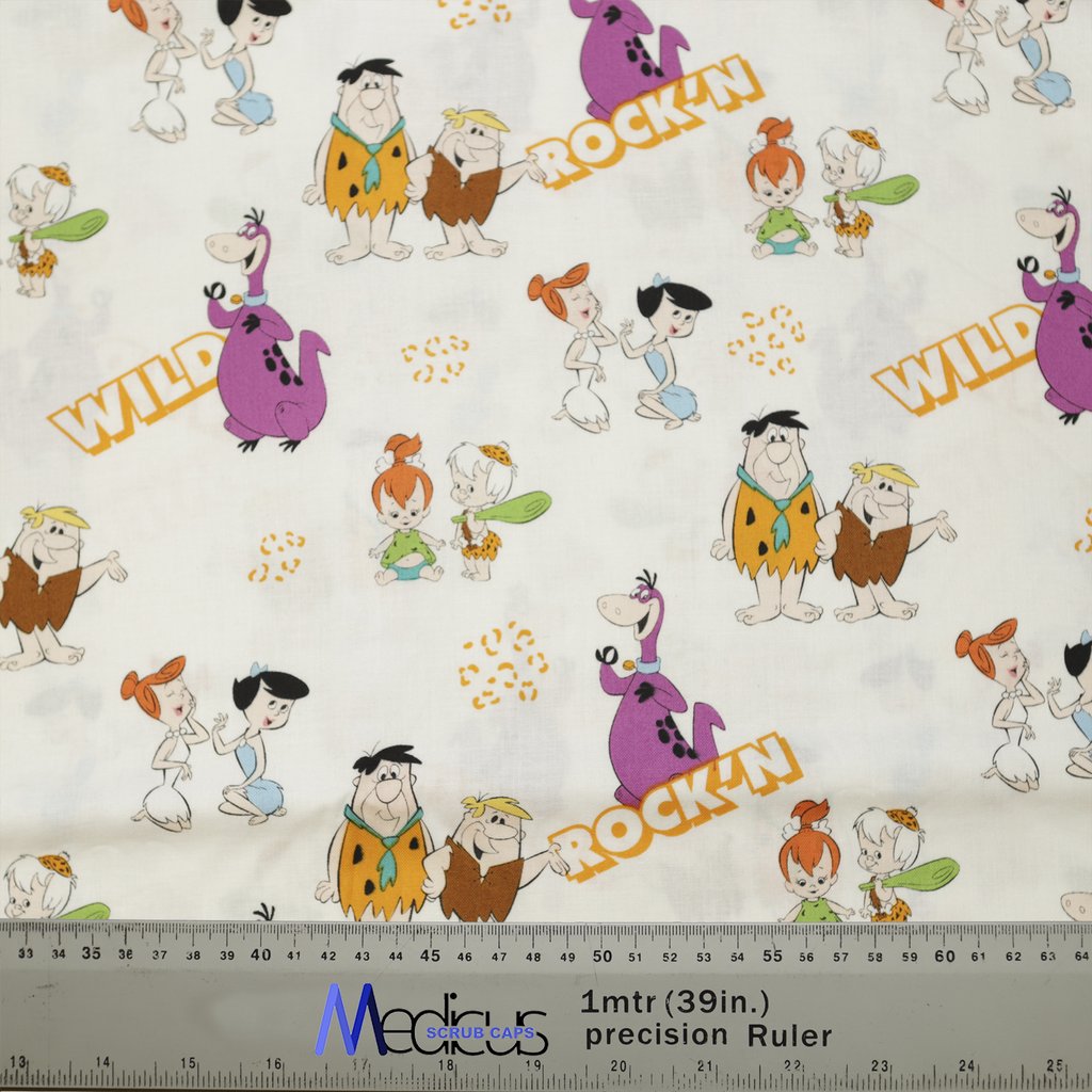 The TV Cartoon Flintstones Wild Scrub Cap by Medicus Scrub Caps features Flintstones characters, "WILD" and "ROCK'N" text, and a ruler at the bottom edge.